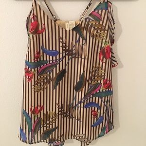 Patterned racerback tank top with ruffles